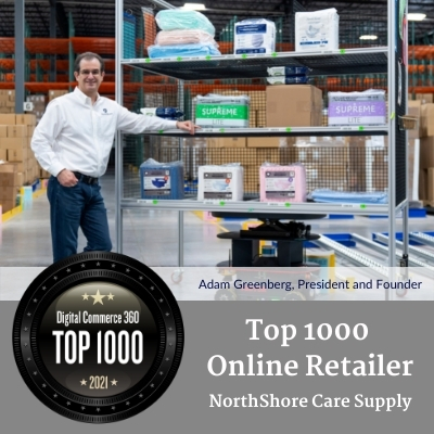 Adam pictured with top 1000 list logo